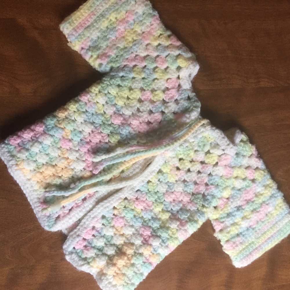 Handmade crocheted baby sweater